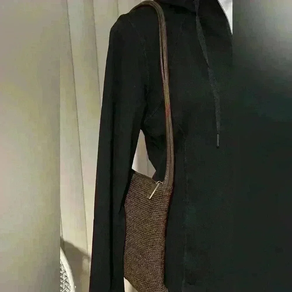 The Sak crochet brown woven shoulder bag / hobo handbag.
